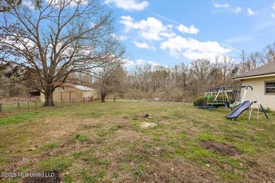 Nestled in the serene countryside of Terry, this 7.6-acre - photo 7