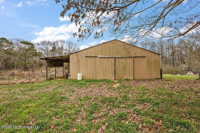 Nestled in the serene countryside of Terry, this 7.6-acre - photo 10