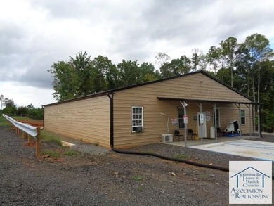 3780 Sq Ft. Building with 2-10' x 10' and 2- 12' x 12' overhead