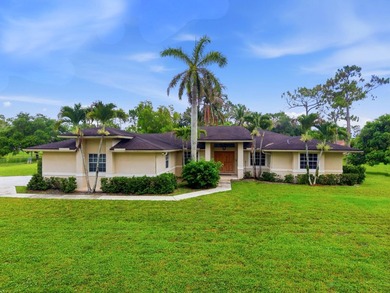 Welcome to your private oasis in the desirable Acreage area of - photo 2