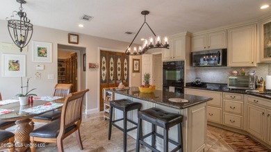 Located in the heart of Diamondhead, this spacious home sits on - photo 8