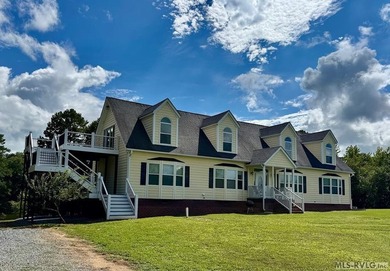 Own a beautiful LAKE House on 4.25 Acres with a gentle slope to - photo 1