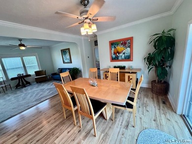 Own a beautiful LAKE House on 4.25 Acres with a gentle slope to - photo 8
