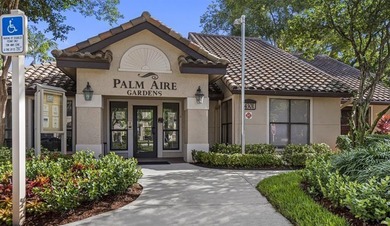 ALL AGES GATED COMMUNITY FIRST FLOOR UNIT TOTALLY REMODELED WITH - photo 1