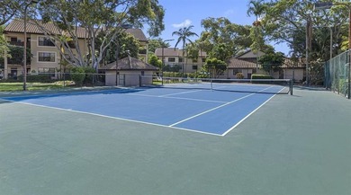 ALL AGES GATED COMMUNITY FIRST FLOOR UNIT TOTALLY REMODELED WITH - photo 2