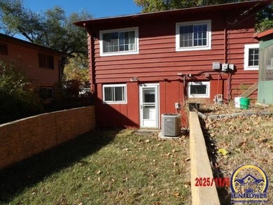 Nice corner lot holds this 3 bedroom, 1.5 bath, bi-level that