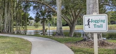 ALL AGES GATED COMMUNITY FIRST FLOOR UNIT TOTALLY REMODELED WITH - photo 7