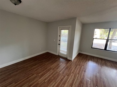 ALL AGES GATED COMMUNITY FIRST FLOOR UNIT TOTALLY REMODELED WITH - photo 10