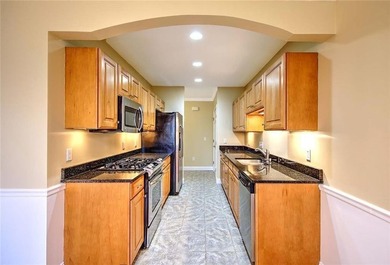 Welcome to this inviting first floor condo offering the perfect - photo 13