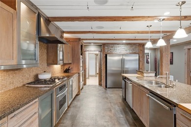 Remarkable Beaver Lake living in this custom built lake home - photo 18