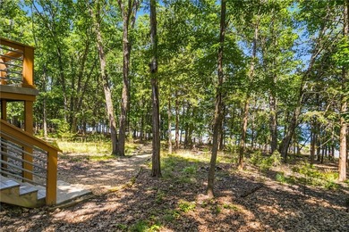 Remarkable Beaver Lake living in this custom built lake home - photo 47