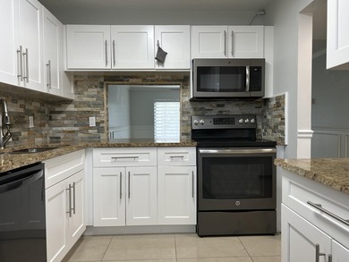 Welcome to this beautifully updated 2-bedroom, 2-bathroom - photo 1