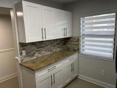 Welcome to this beautifully updated 2-bedroom, 2-bathroom - photo 7