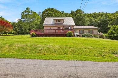 Welcome to 313 Naylor Road, a captivating 1.5-story residence - photo 1