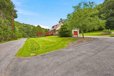 Welcome to 313 Naylor Road, a captivating 1.5-story residence - photo 2
