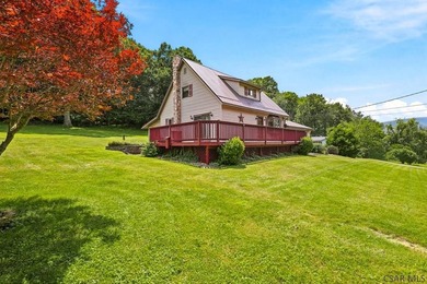 Welcome to 313 Naylor Road, a captivating 1.5-story residence - photo 3