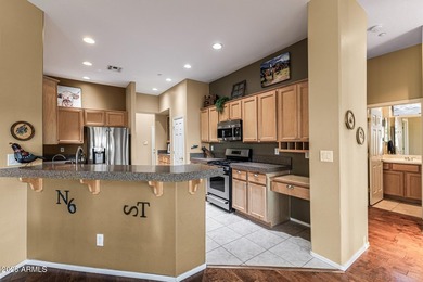 Highly desirable Anthem Country Club home with privacy and