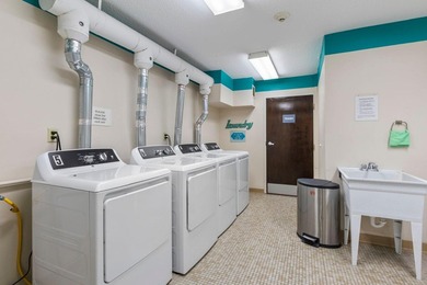 Affordable lake living at Medicine Lake! This top-floor 1-bed - photo 14