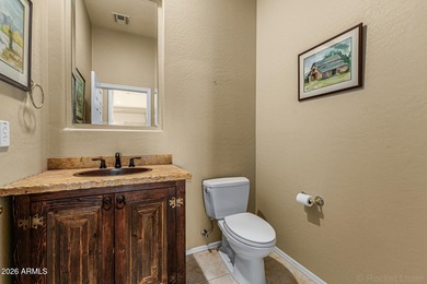 Highly desirable Anthem Country Club home with privacy and