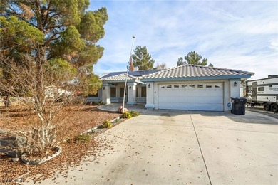 SELLERS ARE MOTIVATED! PAID SOLAR! Well-maintained custom home