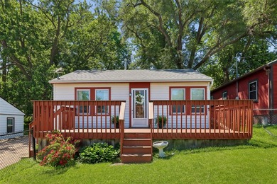 An insulated 3-car garage & a well-cared for 2 BR ranch are - photo 1