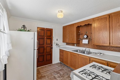 An insulated 3-car garage & a well-cared for 2 BR ranch are - photo 8
