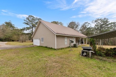 Charming 3-bedroom, 2-bath home situated on a spacious 0.82-acre - photo 22