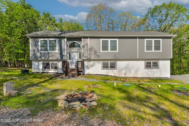 Beautiful 2-year-young bi-level home situated on a spacious - photo 1