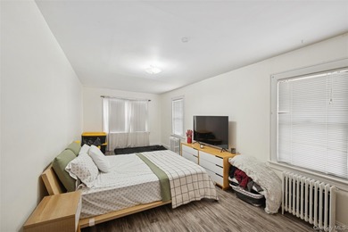 Welcome to this bright and airy two-bedroom, one-bath home which - photo 12