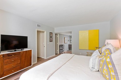 Welcome to this charming two-bedroom, two-bathroom condominium - photo 13