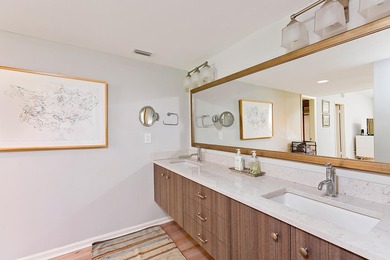 Welcome to this charming two-bedroom, two-bathroom condominium - photo 14