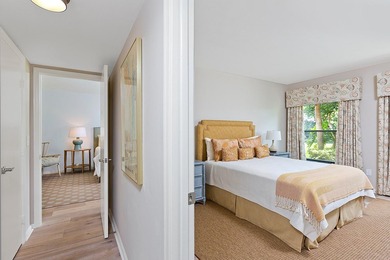 Welcome to this charming two-bedroom, two-bathroom condominium - photo 17