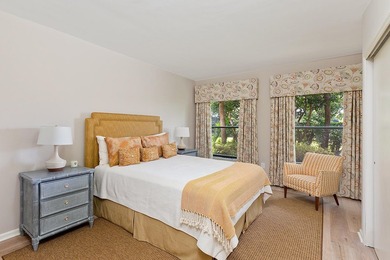Welcome to this charming two-bedroom, two-bathroom condominium - photo 18