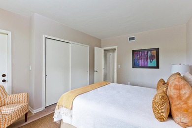 Welcome to this charming two-bedroom, two-bathroom condominium - photo 19