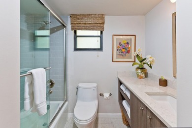 Welcome to this charming two-bedroom, two-bathroom condominium - photo 20