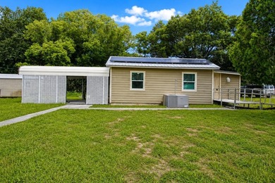 PAID OFF SOLAR + OVERSIZED LOT + METAL ROOF + WATER FILTRATION - photo 4
