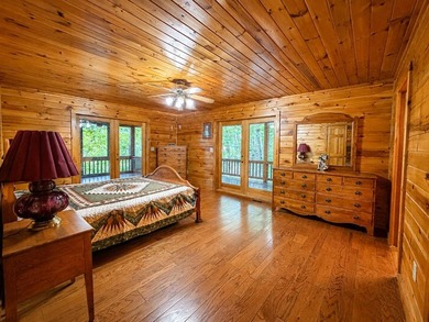 Tucked into a private wooded setting on top of the mountain in - photo 12