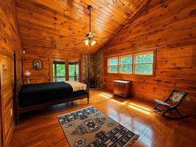 Tucked into a private wooded setting on top of the mountain in - photo 14