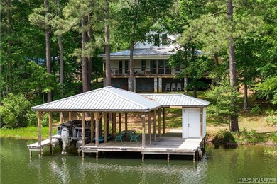 Discover effortless lakefront living in this beautiful - photo 1