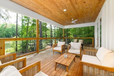 Discover effortless lakefront living in this beautiful - photo 3