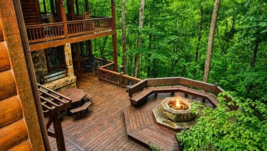 Tucked into a private wooded setting on top of the mountain in - photo 29