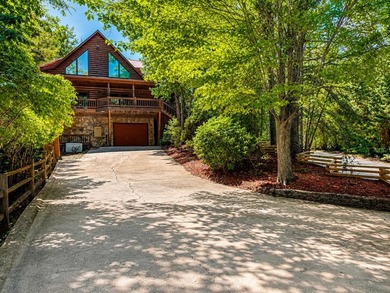 Tucked into a private wooded setting on top of the mountain in - photo 31
