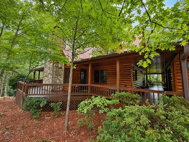 Tucked into a private wooded setting on top of the mountain in - photo 33