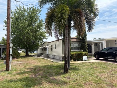 This home is located on the Canal to Lake Huntley and offers 3 - photo 2