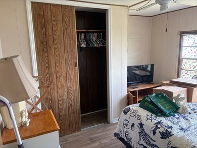 This home is located on the Canal to Lake Huntley and offers 3 - photo 6