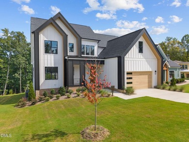 Custom built by Russin Homes in a private community with - photo 2