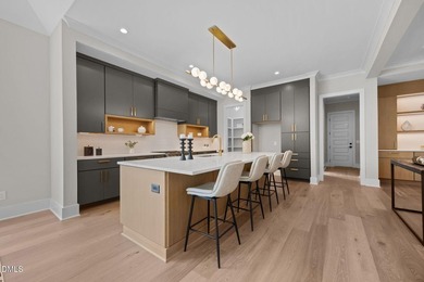 Custom built by Russin Homes in a private community with - photo 6