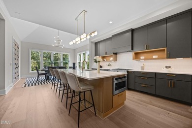 Custom built by Russin Homes in a private community with - photo 9