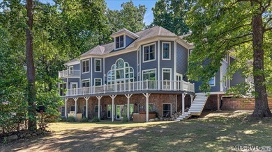 Experience expansive views of Kerr Lake from this impressive - photo 1