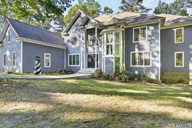 Experience expansive views of Kerr Lake from this impressive - photo 2